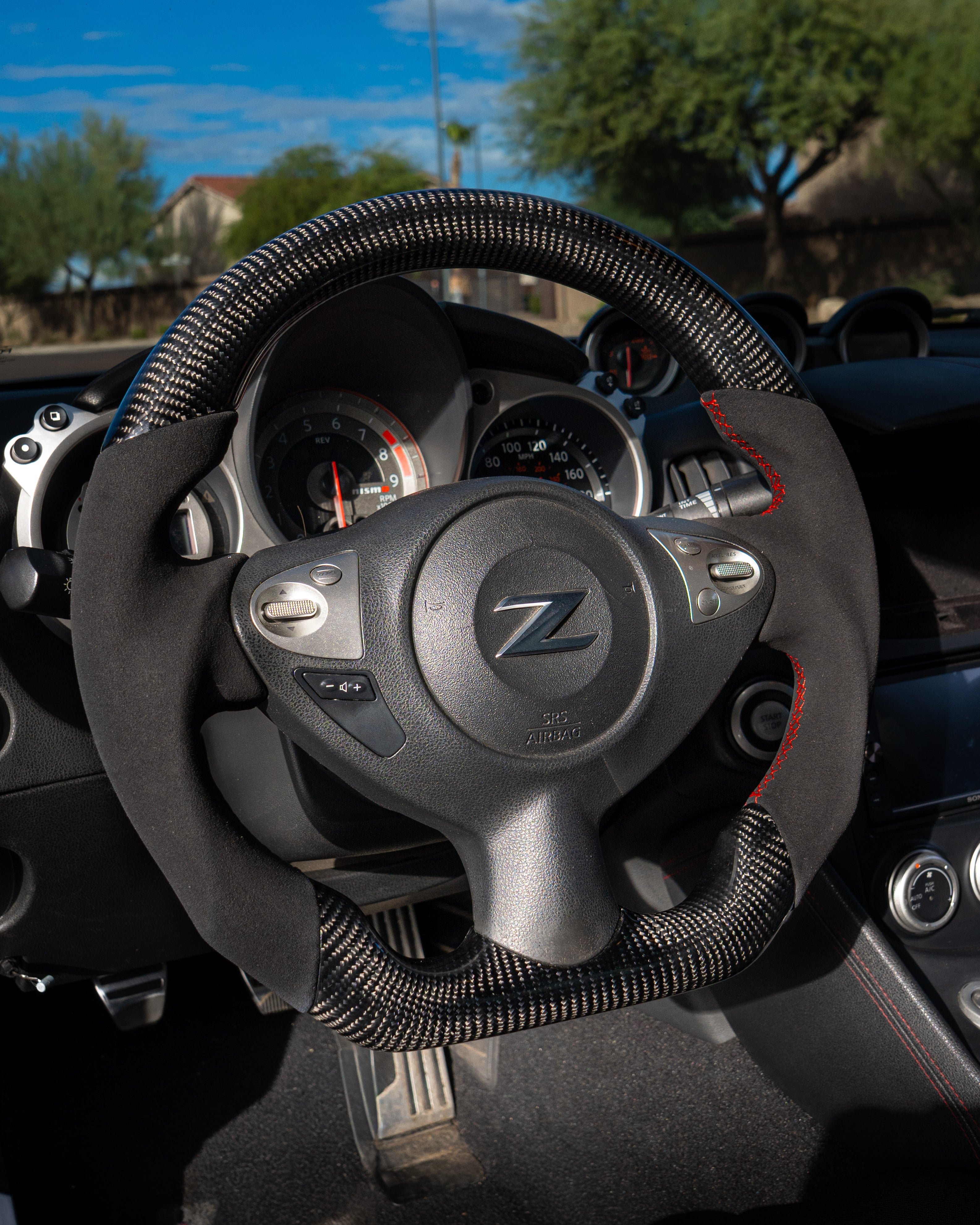 DT Autoworks Custom carbon fiber steering wheels (VQ fitment)