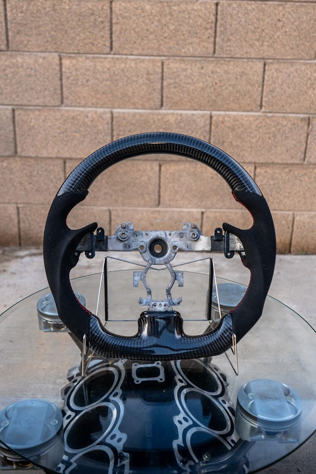 DT Autoworks Custom carbon fiber steering wheels (VQ fitment)